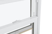Clasp A close up of a white window with a white latch on the sash.