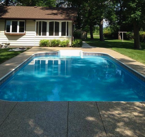 4 benefits of a concrete coating for your garage floor, outdoor patio, and more