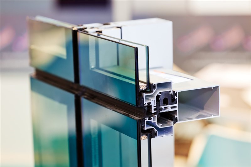 The framing and glass of a window exposed.
